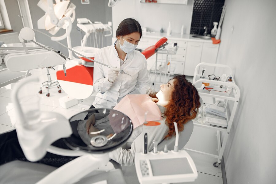 patient consulting to her dentist